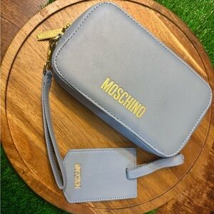 Moschino Sky Blue Wristlet with Gold Details